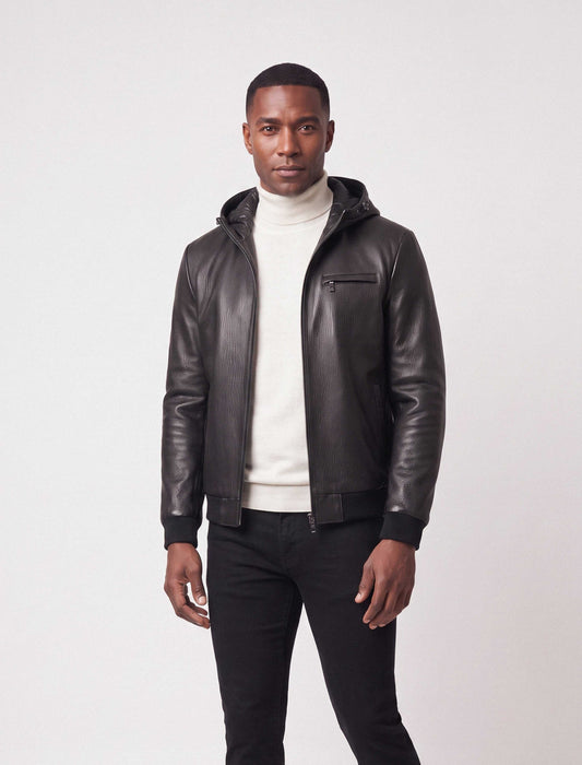 Lorcan Men’s genuine black leather hooded jacket with ribbed trims and zip pockets