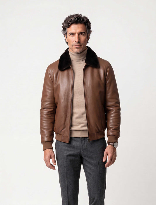 Men's brown leather bomber jacket with black mink fur collar on mannequin