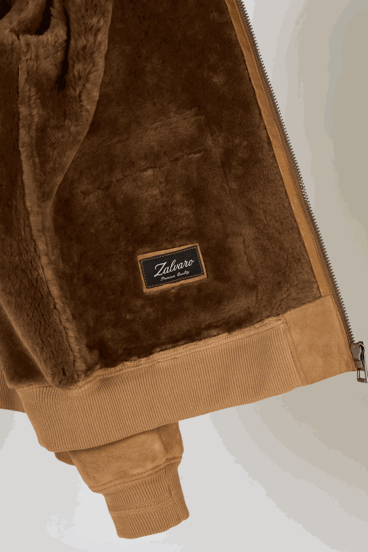 Men's camel shearling suede bomber jacket with full shearling lining and suede exterior