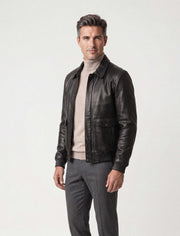 Alden Leather Bomber Jacket in black with textured genuine leather, structured collar, flap pockets, and ribbed trims.