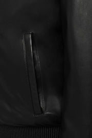 Black Arctic hooded leather bomber jacket with shearling lining for warmth and style