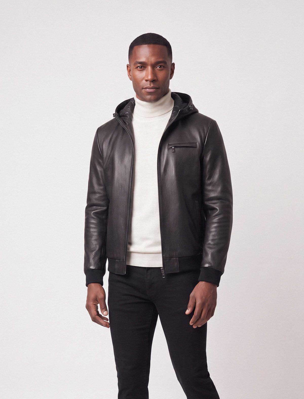 Lorcan Men’s genuine black leather hooded jacket with ribbed trims and zip pockets