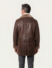 Men's Aspen brown shearling coat with double-breasted front and oversized lapel, made of premium leather and soft shearling lining for winter warmth and style