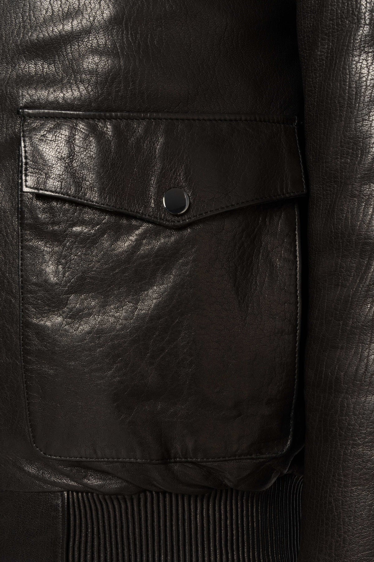 Black shearling leather bomber jacket with curly lamb collar and military-inspired design