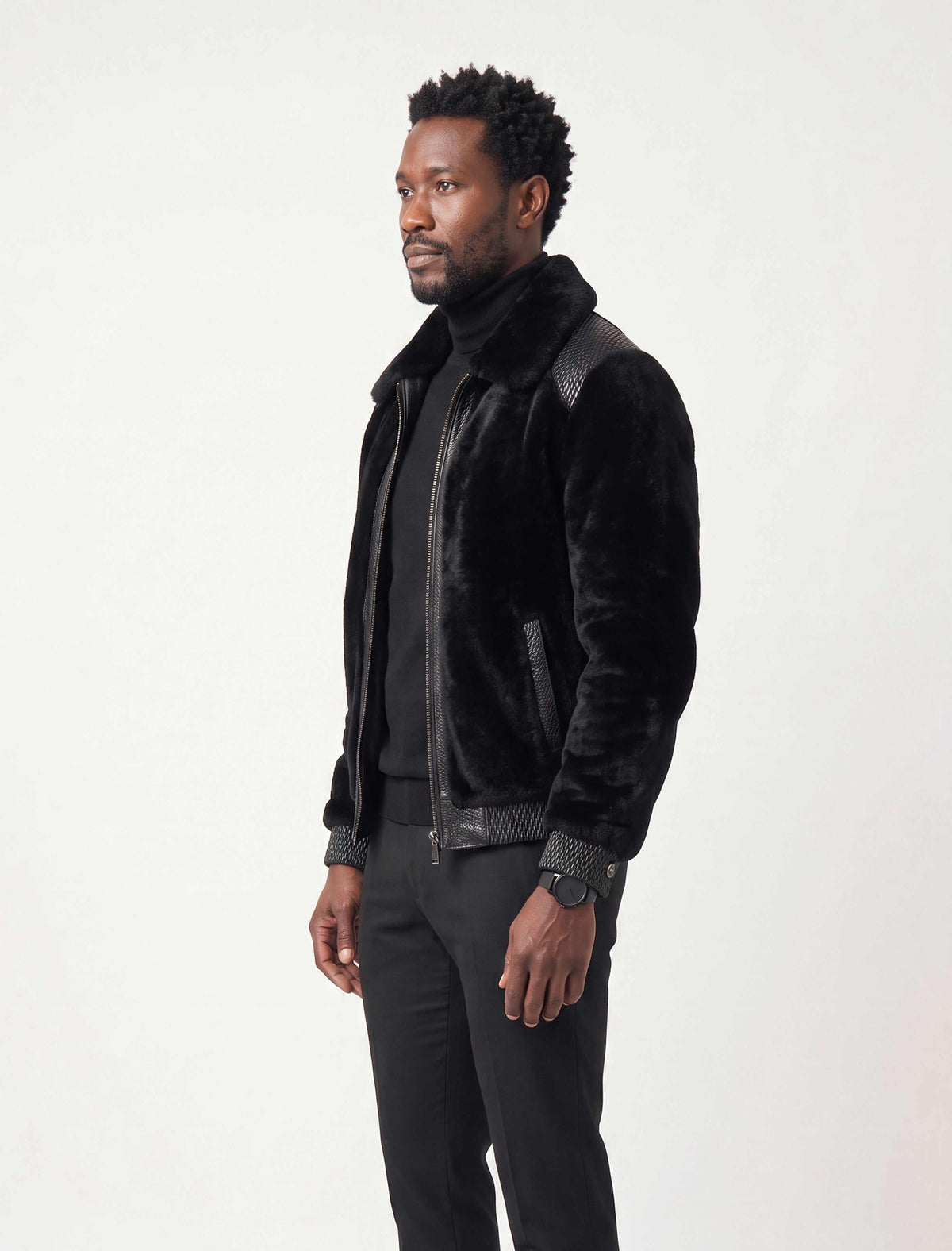 Signature black sheared fur bomber jacket with python leather details for men