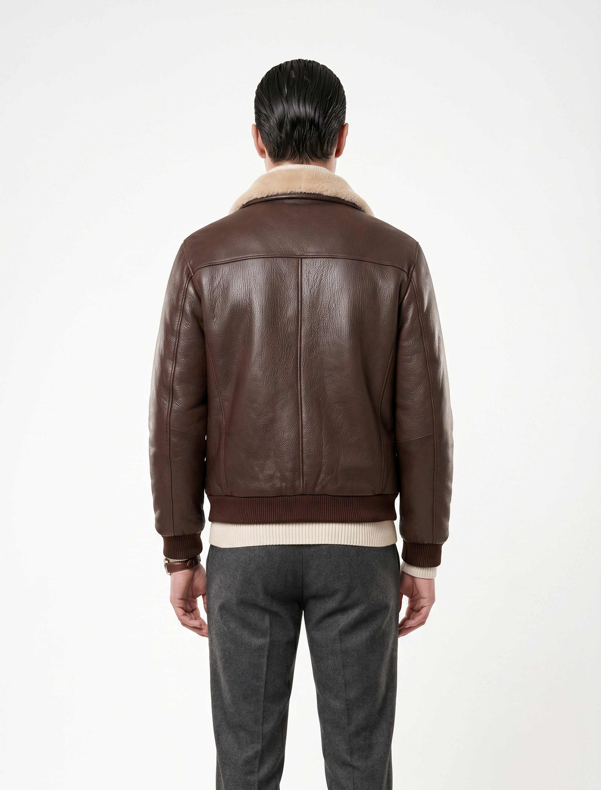 Brown genuine shearling bomber leather jacket with cream shearling lining for warmth and elegance