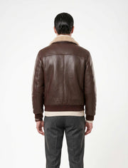 Brown genuine shearling bomber leather jacket with cream shearling lining for warmth and elegance