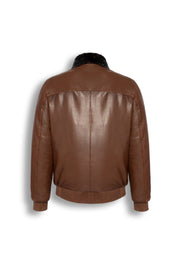 Men's brown leather bomber jacket with black mink fur collar on a white background