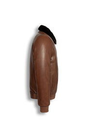Men's brown leather bomber jacket with black mink fur collar on a mannequin
