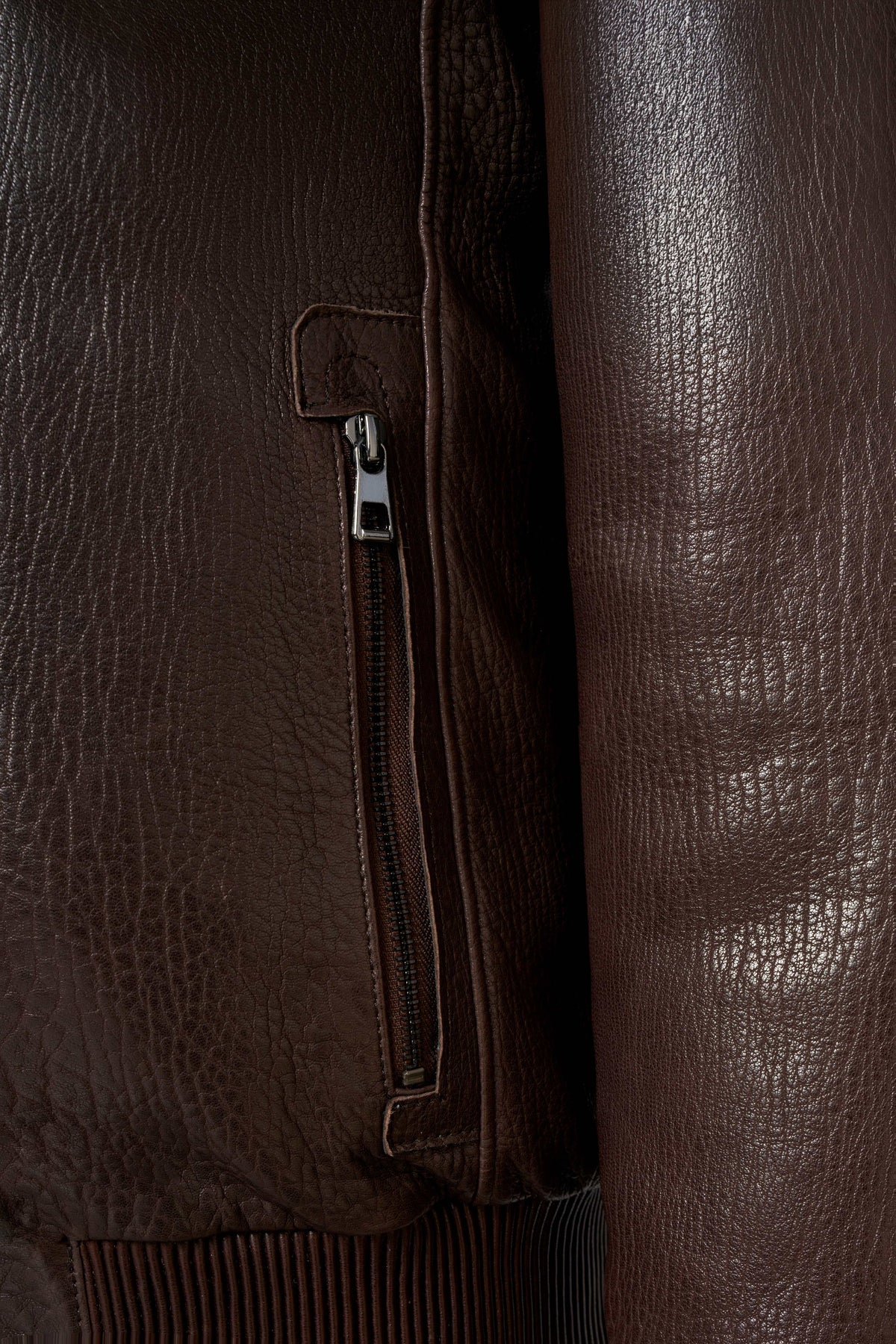 Brown genuine shearling bomber leather jacket with cream lining for warmth and style