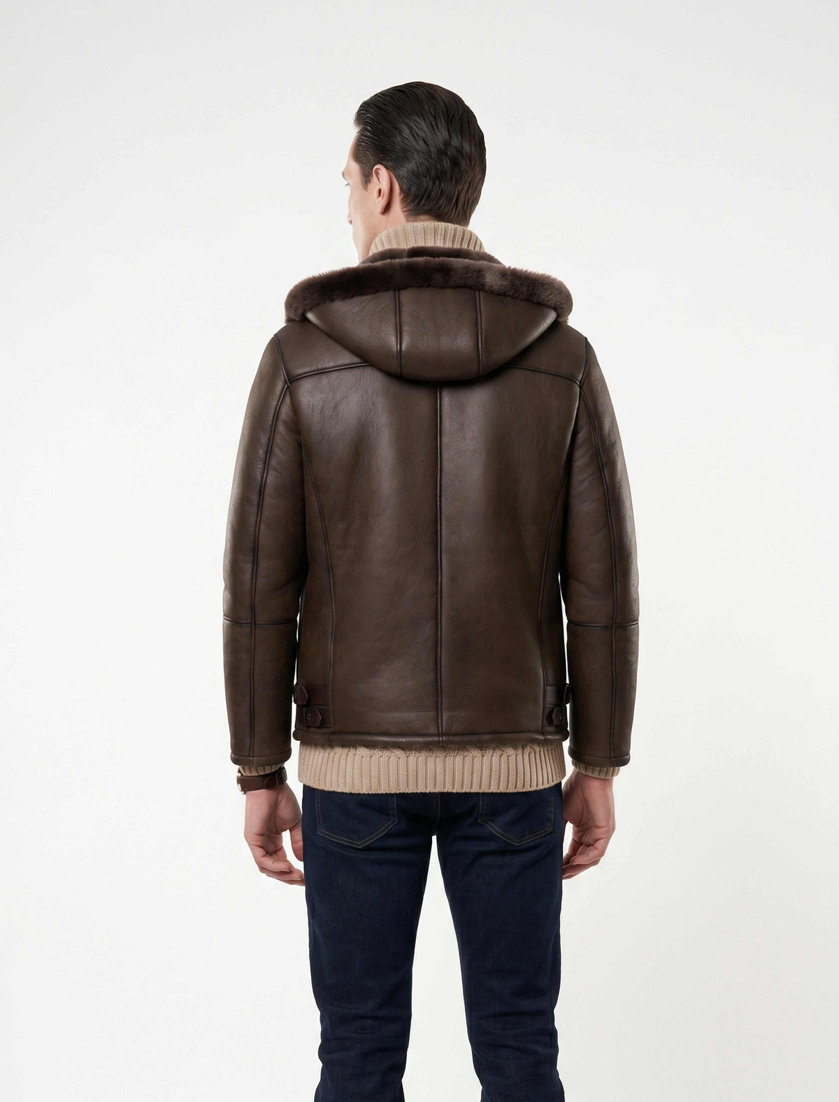 Dark brown hooded shearling leather jacket with natural shearling interior for winter warmth