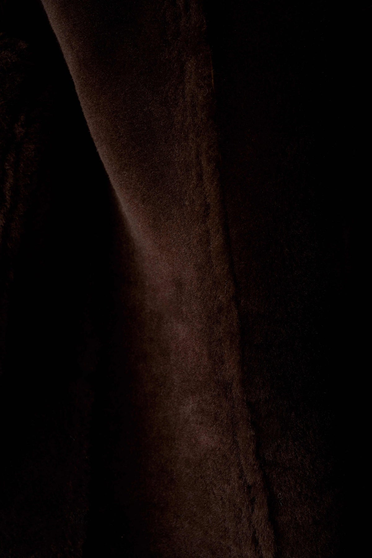 Dark brown hooded shearling leather jacket with full natural sheepskin interior for winter warmth