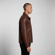 Hudson Leather Overshirt in rich brown full-grain leather with chest and hand pockets, tailored silhouette, and premium craftsmanship
