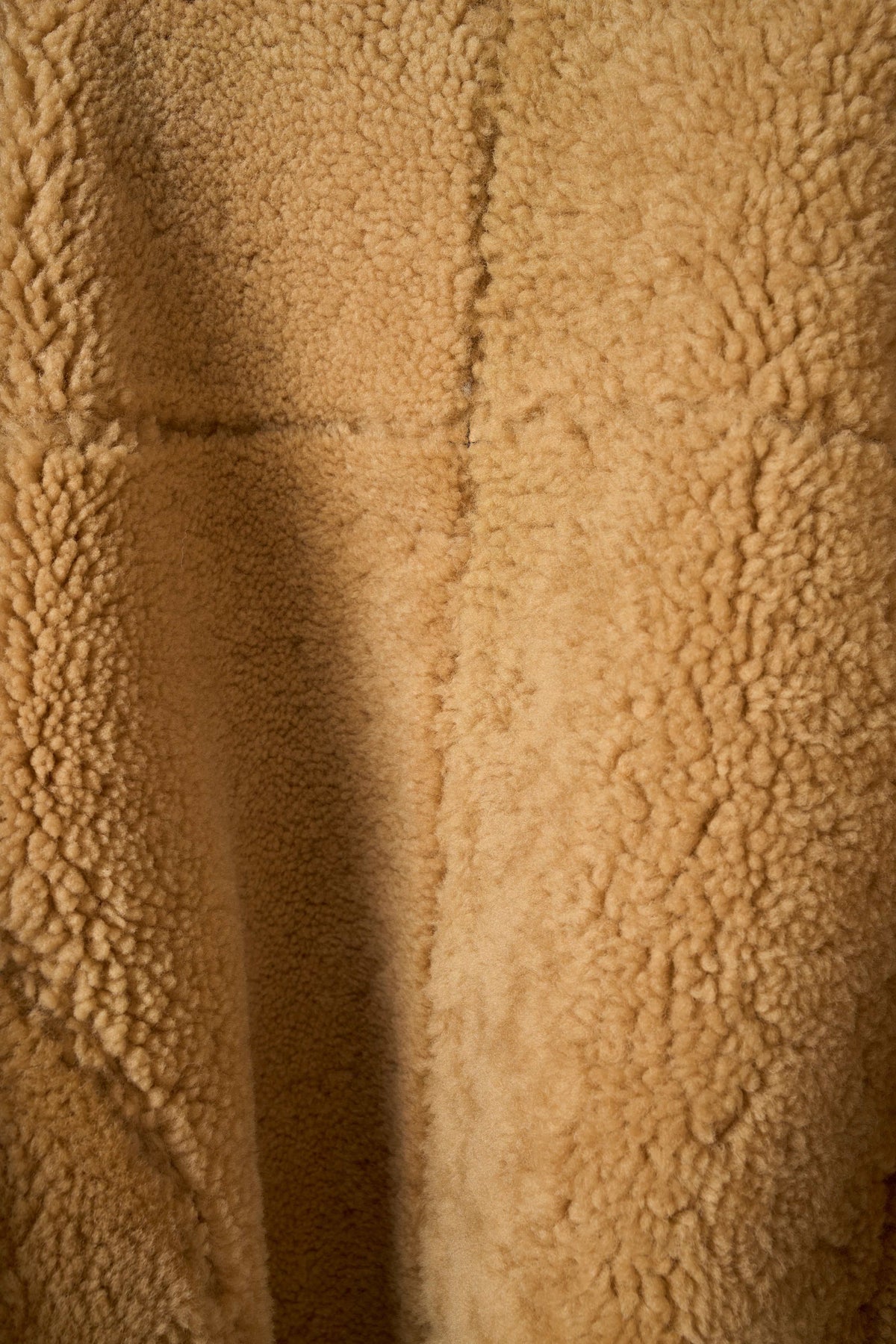 Tan genuine shearling leather aviator jacket with soft shearling lining and classic B-3 flight design