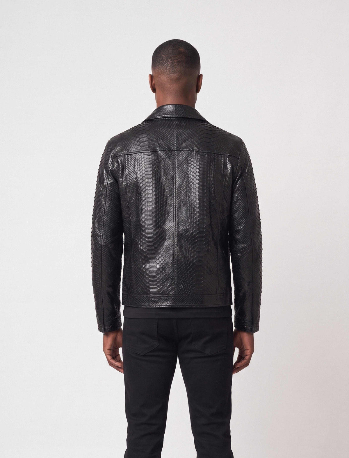 Nero Black Genuine Python Leather Trucker Jacket with natural scale pattern and structured chest pockets