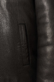 Heritage Hooded Shearling Leather Jacket in black with detachable fur-trim hood and premium leather
