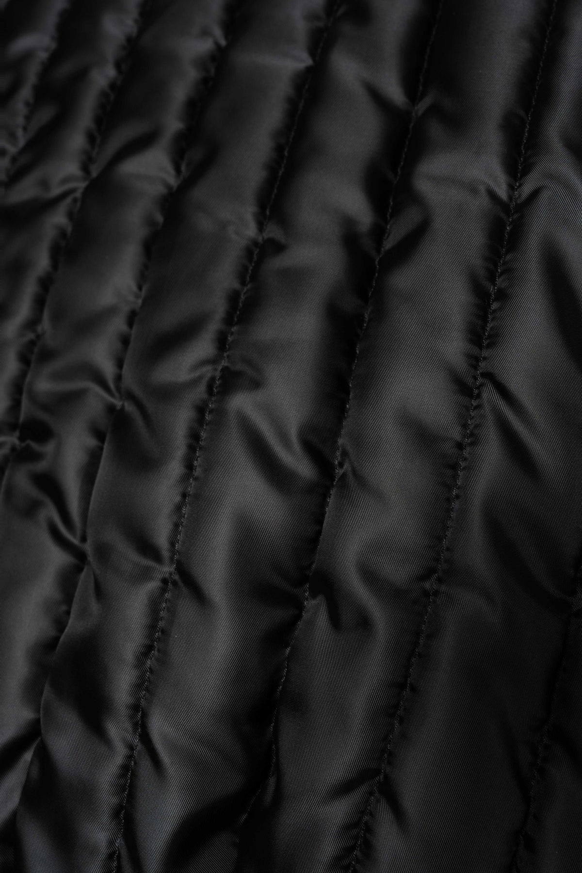 Noir Quilted Shearling Leather Bomber jacket in black lamb leather with soft shearling collar and tailored fit