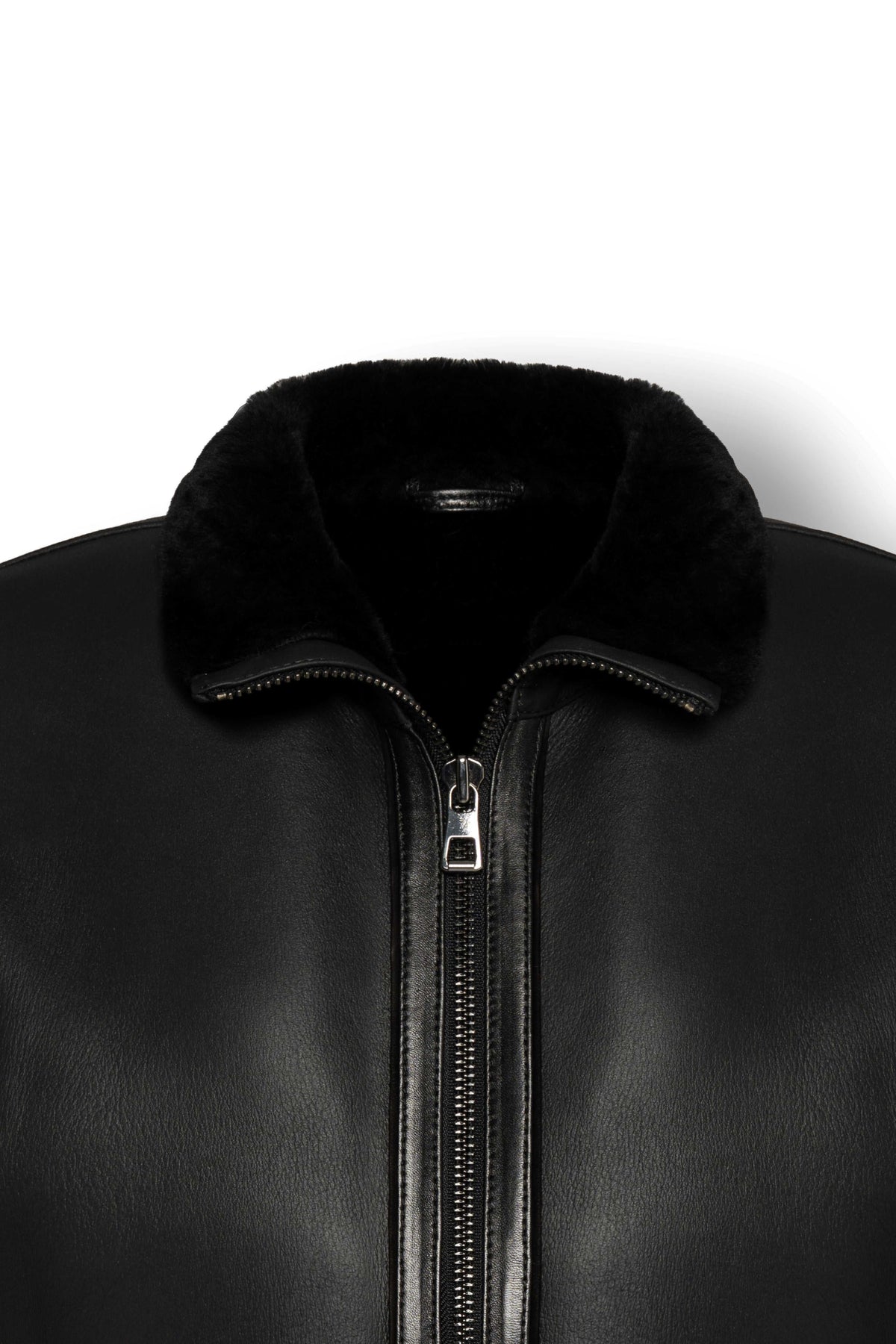 Noir Shearling Leather Bomber Jacket with shearling collar and premium metal hardware, showcasing timeless elegance and warmth