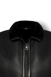Noir Shearling Leather Bomber Jacket with shearling collar and premium metal hardware, showcasing timeless elegance and warmth
