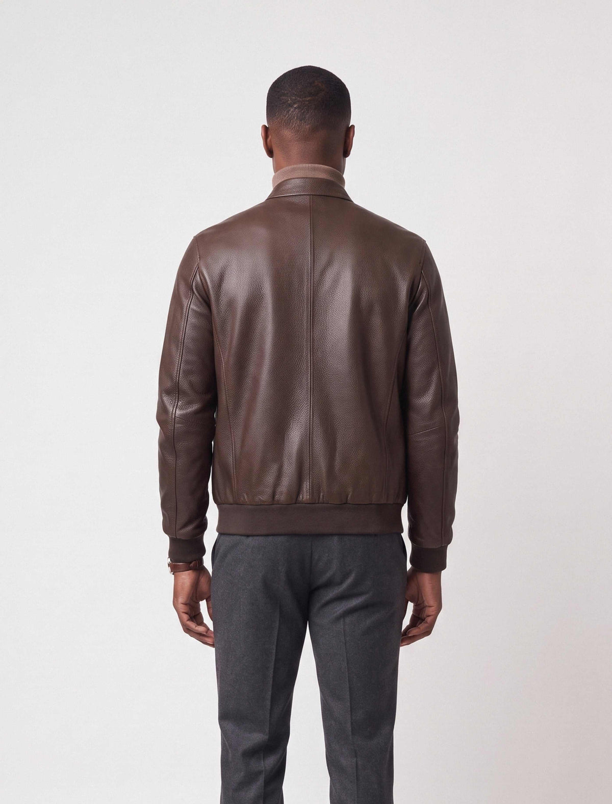 Siena Dark Brown Leather Bomber Jacket made from soft full-grain lambskin with a streamlined stand collar and ribbed cuffs.
