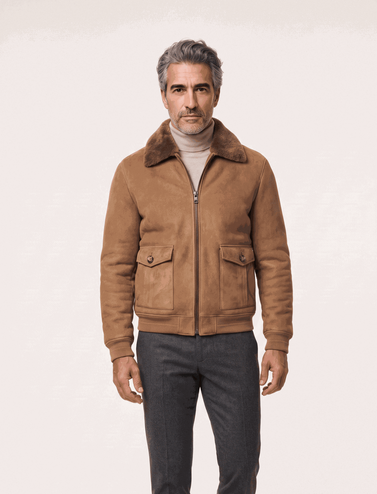Men's camel shearling suede bomber jacket with full zipper and flap pockets on a mannequin