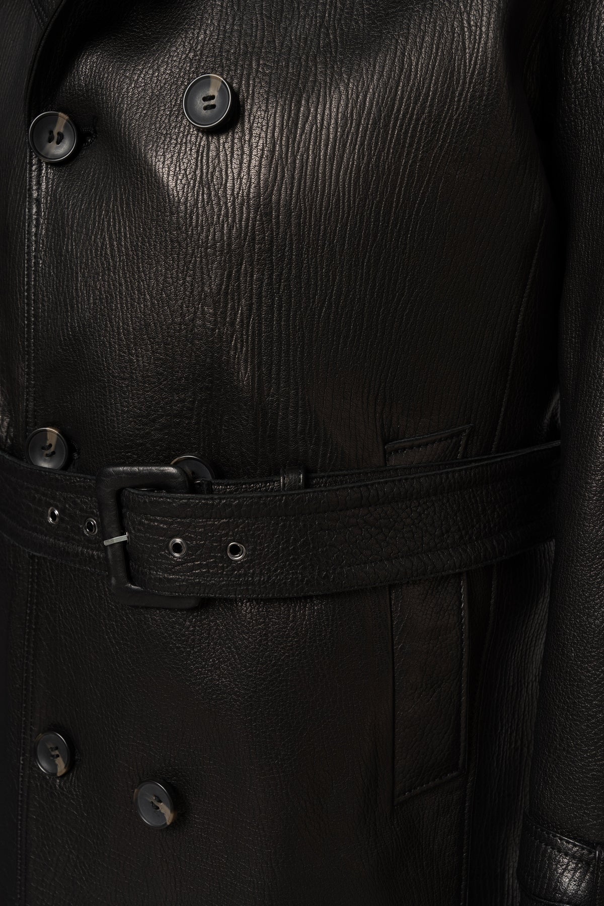 Adjustable leather waist belt detail on Valmont black trench coat