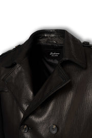 Close-up of wide leather lapels and double-breasted construction on Valmont trench coat
