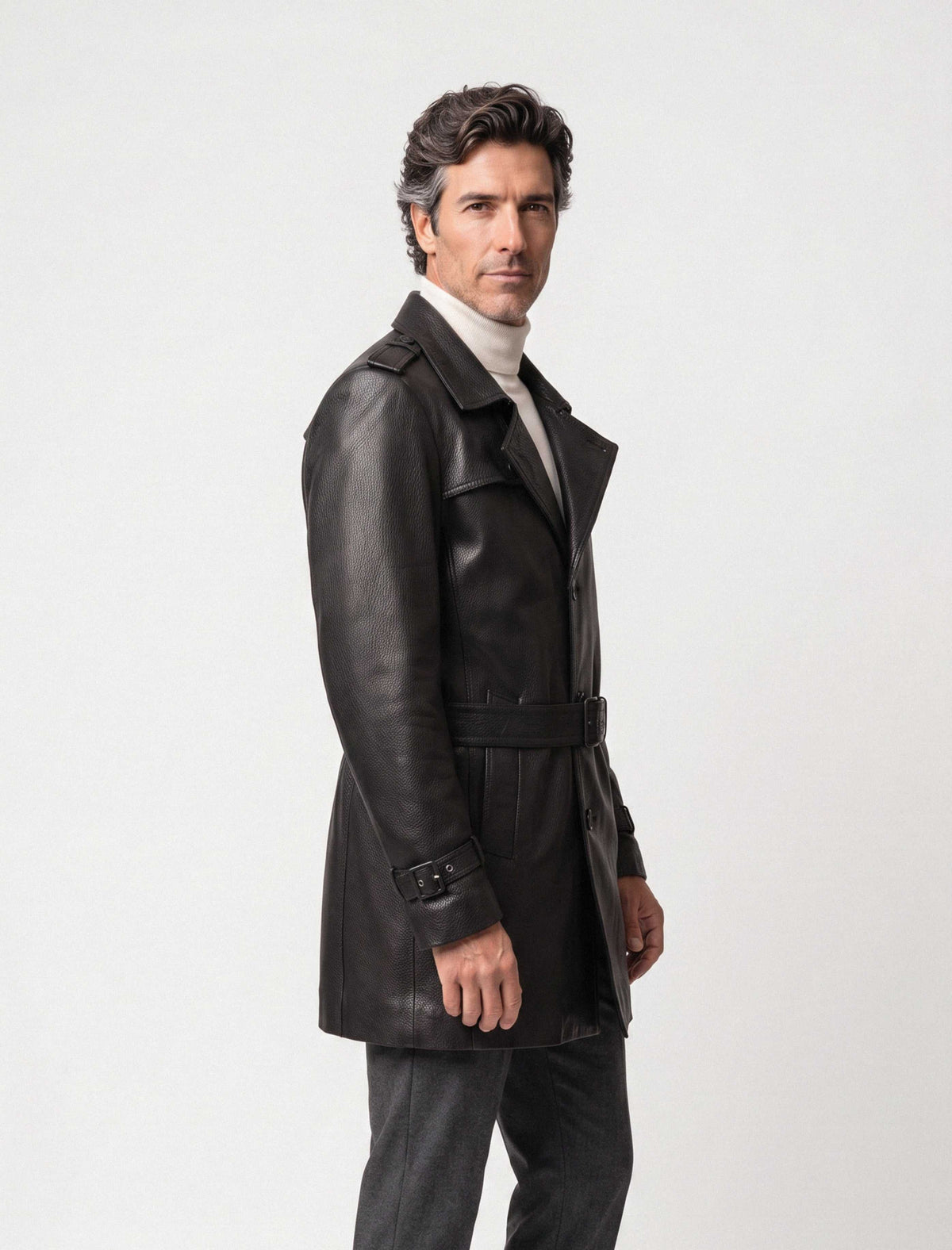 Man wearing Valmont belted black leather trench coat three-quarter view