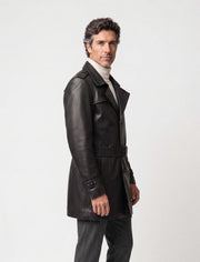 Man wearing Valmont belted black leather trench coat three-quarter view