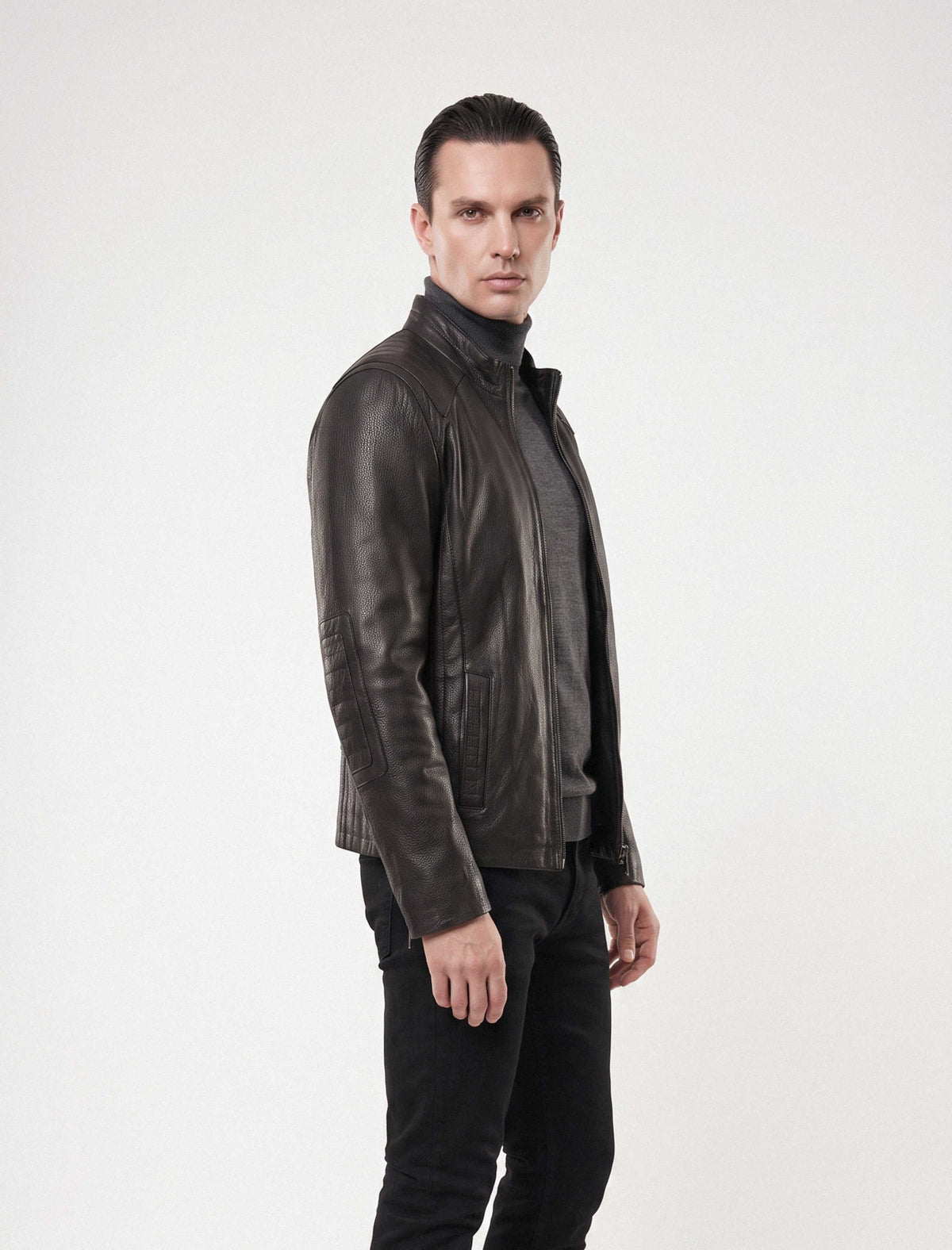 Varenn Men’s genuine black leather racer jacket with quilted shoulders and stand collar