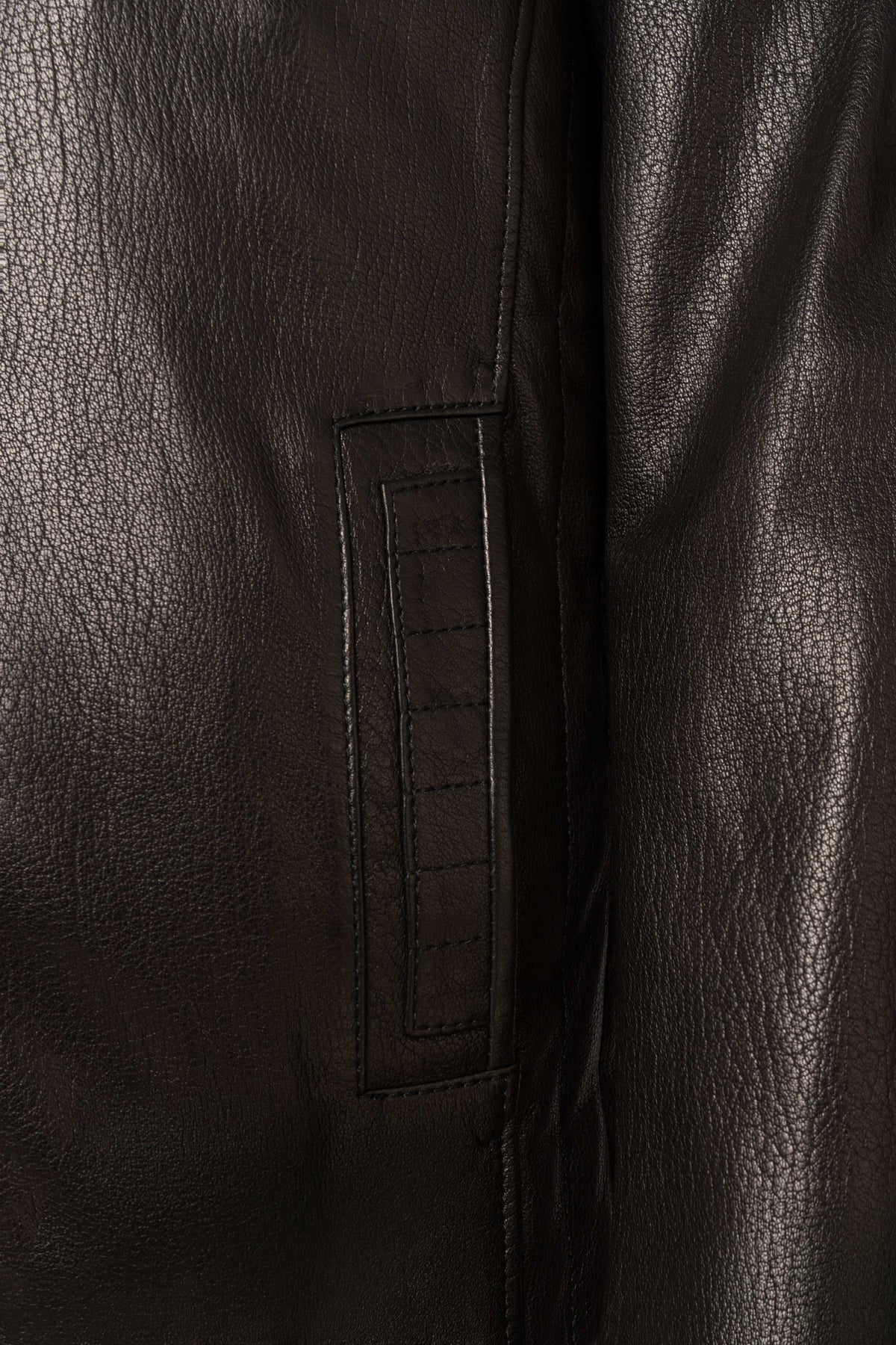 Varenn Men’s Leather Racer Jacket in black with quilted shoulders and stand collar