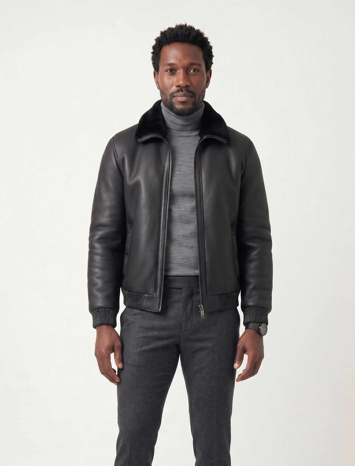 Noir shearling leather bomber jacket with shearling collar and premium metal hardware